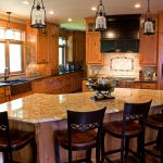 gorogeus kitchen remodeling ideas with wonderful wooden kitchen cabinet also interesting glossy granite top table with elegant dark brown chairs in hardwooden flooring concept