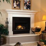 modern minimalist fireplace construction in black-white tone beautiful painting in gold-accent frames classic table lamp