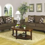 contemporary living room idea with elegant brown microfiber sofa also elegant soft purple painted wall with ravishing glossy table and fur rug in laminate flooring