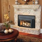 modern gas fireplace in  white-washed natural stones mantel building  hardwood floor system luxurious rug  a round console table with decoration on it