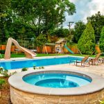 best backyard pools in rectangle shape combined with round sauna plus fun playground together with lounge pool chairs and garden plus wood fence