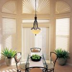 cool window treatments nyc with blinds in dining room with glass top table and cool chairs beautified with plant pot