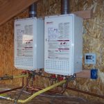 double tankless water heater installation in attic on the wood wall