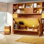 beautifl yellow fold up wall bed design with full storage idea with laminated flooring idea and small armoire and narrow yellow  rug and white puff and large glass window