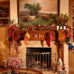 christmas decorations for mantels fireplace with stockings and garland plus ribbon and pretty candle holders plus artistic painting on wall