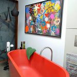elegant colored bathtubs for small bathroom with stylish black pendant lamps and round end tables  plus artistic wall art on wall decoration