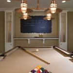 Combined basement lighting idea for basement game room with a billiard table yard chalkboard wall decoration and floating shelf for organizing some decorative items