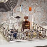 best parfume organizer fro nicle miller home decor made of stainles steel in rectangle shape with rings order on white vanity and patterned wall