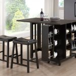compact black wooden bar table for home design with racks for table ware and black leather stools on wooden floor with gray wall and open plan