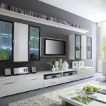 luxurious flat screen tv wall cabinet in white wood scheme decorated with shelf and media storage plus wall mount shelf and rug decorated on grey painted wall