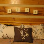 pillows wall wood bed