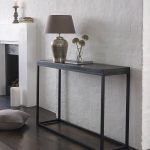 slim console table for home furniture ideas in black with wooden top and iron leg decorated with cool table lamp and glass vase plus dark hardwood flooring