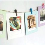 Colorful wood clips as decorative photo hanging tools