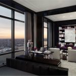 Modern Apartment With Black Color Living Room Libabry On Wall Purple Sofa With Two White Chairs And Long Curtains On Big Windows