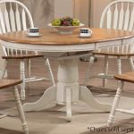 Wooden White Round Table WIth Four Chairs And Simple Carpet