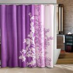 long and wide shower curtain liner with purple and pink color and flower picture cover the white bathtub