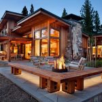 unique contemporary wooden house design with outdoor living space with open plan and fire pit and wooden bench