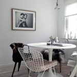 vintage dining space idea with ikea chair desgn and white wire chair and black and traditional pendant and white washed wooden floor