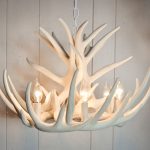 awesome home ideas with white antler chandelier with a lot of bulbs and chains plus canopy mounting kit plus wooden wall