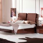 best ikea sheepskin rug idea in black tone in bedroom with wooden rattan platform bed and white sheet and floor to ceiling glass window with wall palette