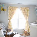 Patterned Yellow And White Blackout Curtains Nursery With White Crib And Wal Mounted Shelf