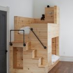 Wooden loft bed with stairs and under bed addition in modern style