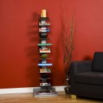 best freestanding bookshelves design aside dried plant and red wall and black velvet sofa