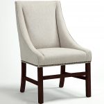 comfy white upholstered dining chair arranged with nailhead with sophisticated backs