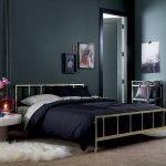 stunning black bedroom design with black sheet and metal platform bed and white faux fluffy rug