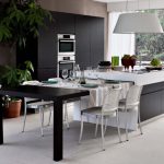 the-functional-and-adaptable-monoblocco-island-a-white-kitchen-island-with-black-pull-out-table-in-various-lengths-for-small-or-large-table