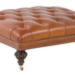 Brown tufted leather Ottoman coffee table with artistical wood legs