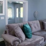 L Shaped Oversized Couches Living Room With Turquoise Pillows And Grey Room Wall