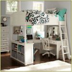 Pretty white girls loft bed idea with U shaped desk bookshelf and ladder