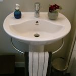 Small White Pedestal Sink With Towel Bar