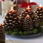 pinecone display with candles,