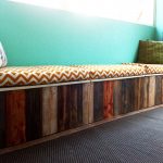 Unique Wooden Long Bench With Storage And Stylish Cushion Plus Turquoise Wall