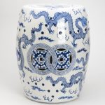 Blue and white oriental garden stool with dragon pictures