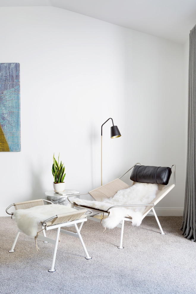 modern reclining chair with black leather neck rest white fury blanket modern table with white fury blanket white area rug tiny floor lamp with black shade