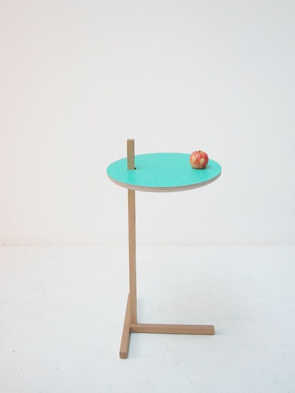 fun skinny side table with blue round top and wood stick support & bottom