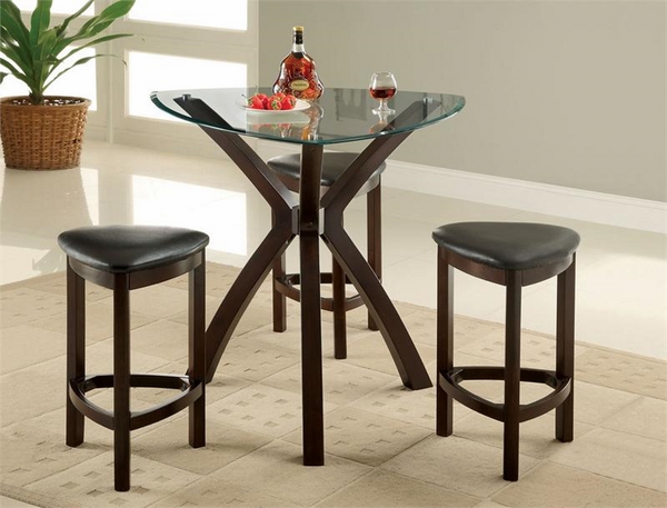 glass top triangle dining table with dark wood X legs black leather triangle stools with dark wood legs