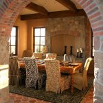 rustic mediterranean dining room dining chair slipcovers with multi pattern & color terracota tiled floors clay burnt walls fireplace with stone surrounding
