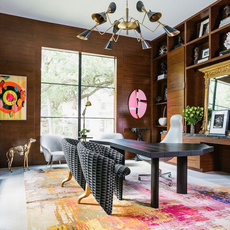 contemporary home office with home panelings black finish working desk contemporary chairs gray lounge chairs bold colored carpet contemporary brass chandelier