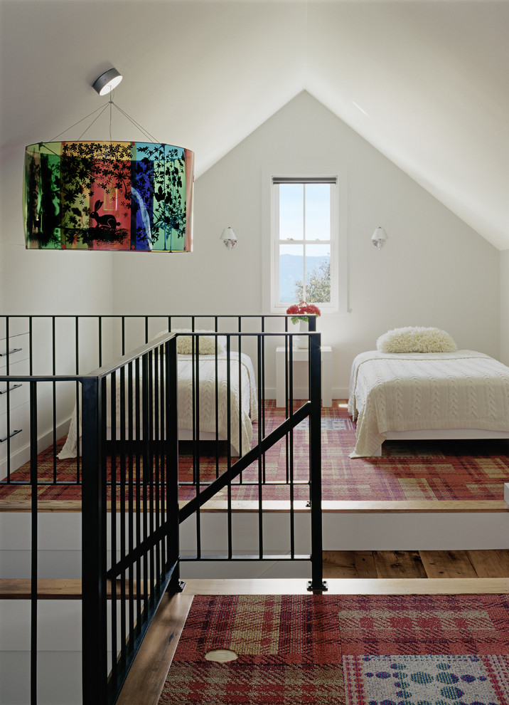 transitional kids bedroom custom carpet in red color black wrought iron railings attic roof in white twin bed frame centered window