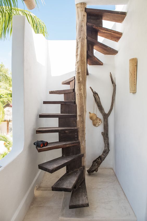 spiral exterior stairs with tree supported