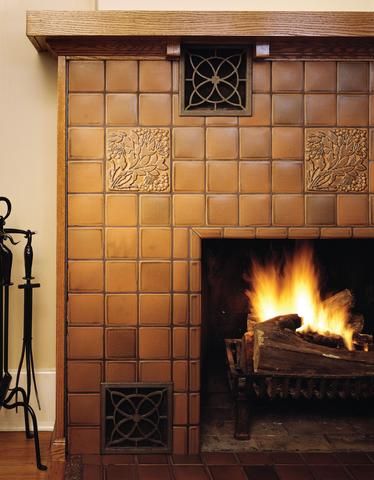 traditional fireplace with sepia tile mantel