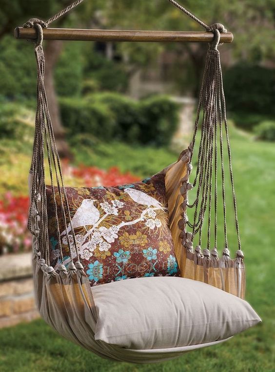 hanging chair for outdoor with additional throw pillows