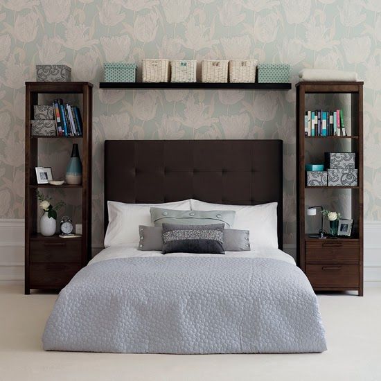 tiny bedroom idea bed frame with tufted headboard in dark color hue dark wood side shelves upper shelf for baskets