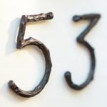 amazing house numbers dark brown wood crafted five number dark brown wood crafted three number in white painted wall
