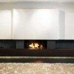 elegant Picket Vainness Including Beige Fur Rug On laminate wooden Flooring In Living Room