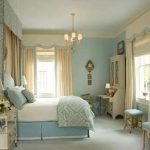 sky blue painted wall sky blue carpet floor white side table white drawer white chest vintage patterned blanket sky blue painted ceiling great bedroom color cool colors for bedroom